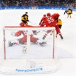 GANGNEUNG, SOUTH KOREA - FEBRUARY 25: Germany's Dominik Kahun #72 gets the puck past Olympic Athletes from Russia's Vasili Koshechkin #83 to score a third period goal with Mikhail Grigorenko #25 and Bogdan Kiselevich #55 looking on during gold medal round action at the PyeongChang 2018 Olympic Winter Games. (Photo by Matt Zambonin/HHOF-IIHF Images)

